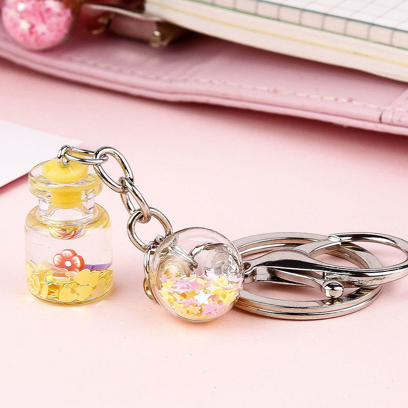 Colgante de Llavero de Botella de Quicksand con Flor Lindo para Estudiante Femenina