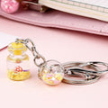 Colgante de Llavero de Botella de Quicksand con Flor Lindo para Estudiante Femenina