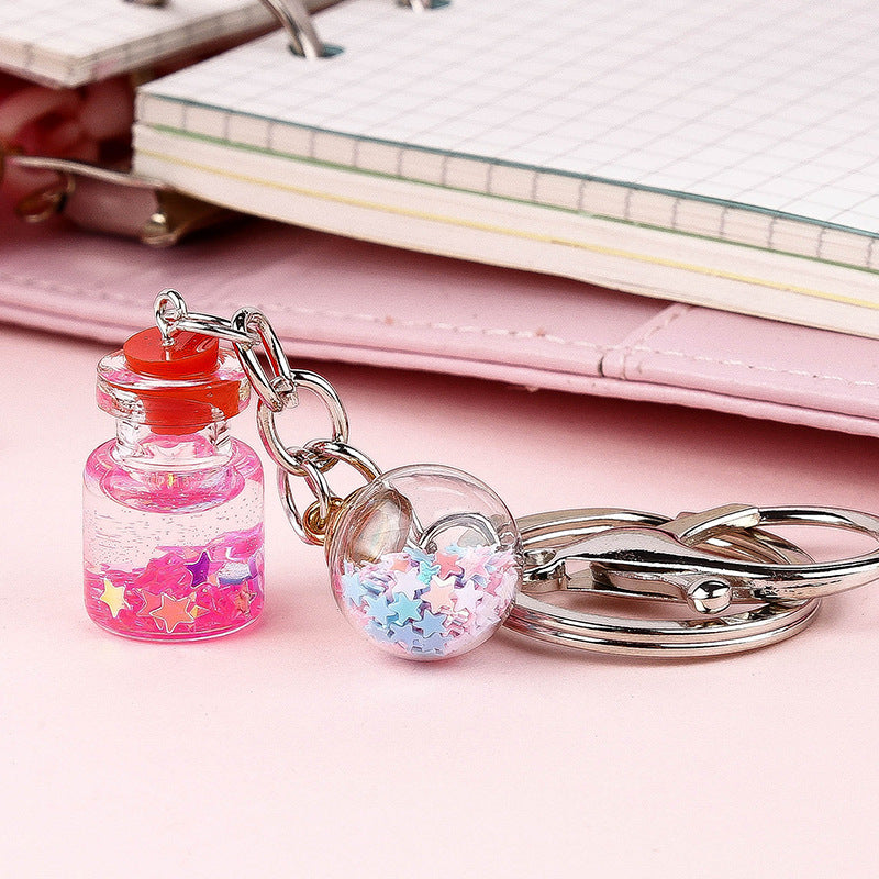 Colgante de Llavero de Botella de Quicksand con Flor Lindo para Estudiante Femenina