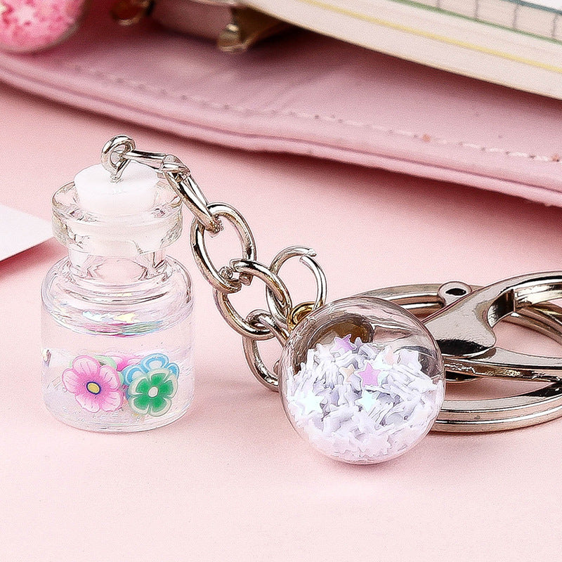Colgante de Llavero de Botella de Quicksand con Flor Lindo para Estudiante Femenina