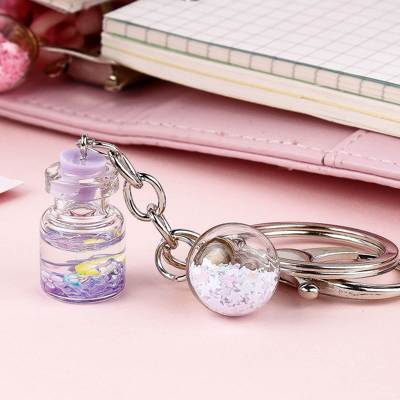 Colgante de Llavero de Botella de Quicksand con Flor Lindo para Estudiante Femenina