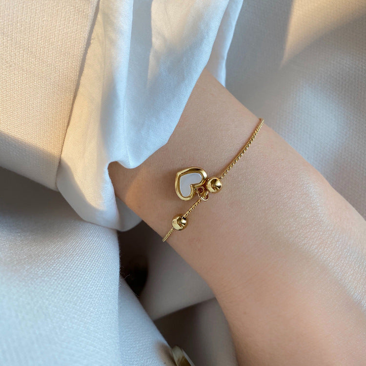 Pulsera de cuentas ajustables de corazón de melocotón con nácar blanco y fritilaria