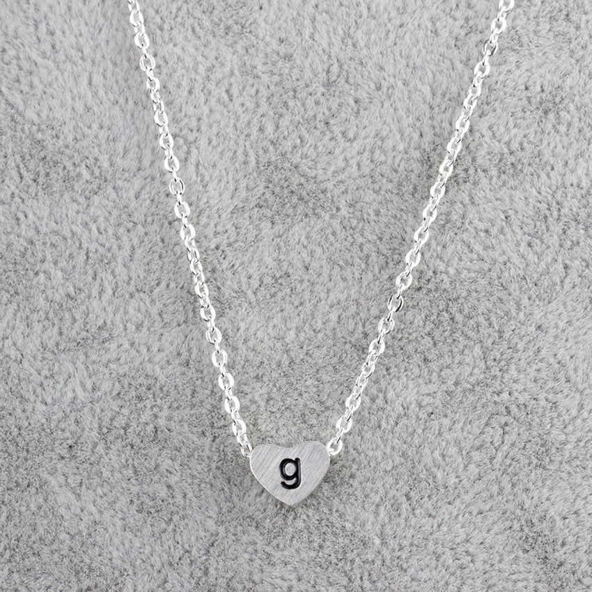 Collar con colgante de 26 letras de acero inoxidable para mujer