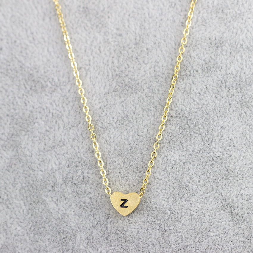 Collar con colgante de 26 letras de acero inoxidable para mujer
