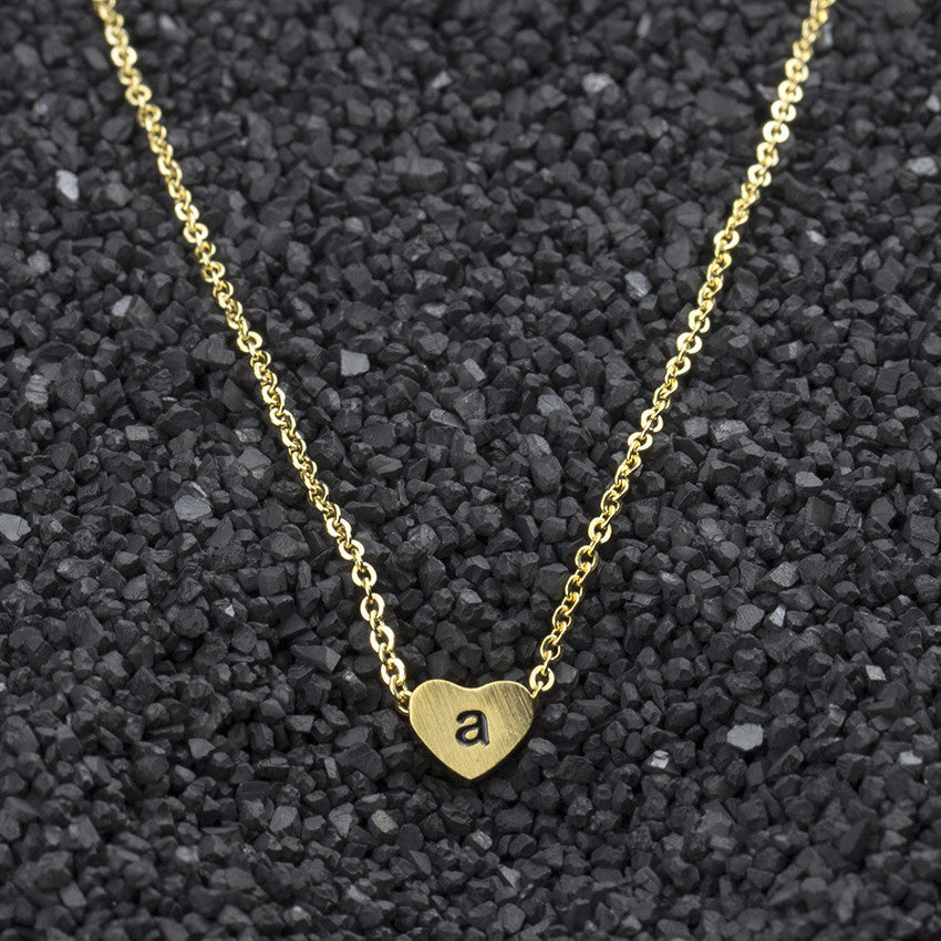 Collar con colgante de 26 letras de acero inoxidable para mujer