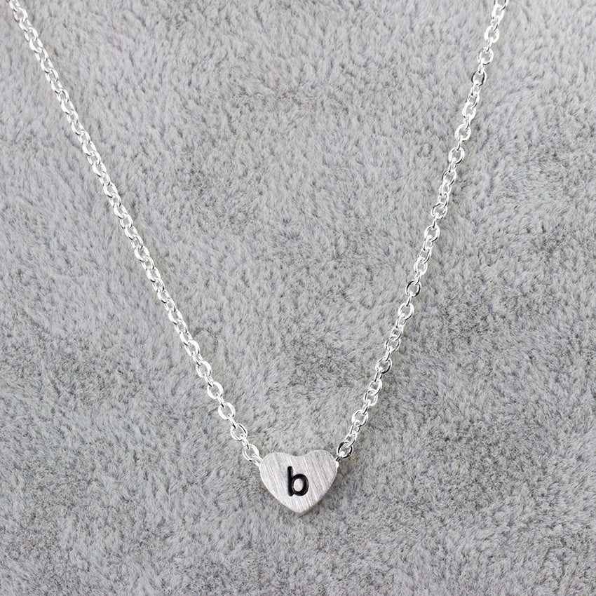 Collar con colgante de 26 letras de acero inoxidable para mujer