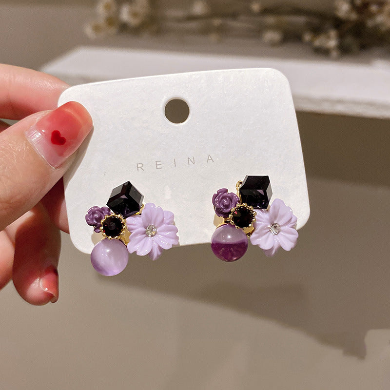 Aretes de flor de cristal ojo de gato diamante estilo coreano "Puerta del Este"