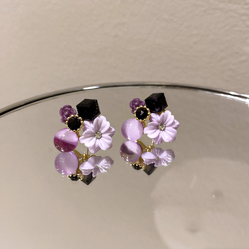 Aretes de flor de cristal ojo de gato diamante estilo coreano "Puerta del Este"