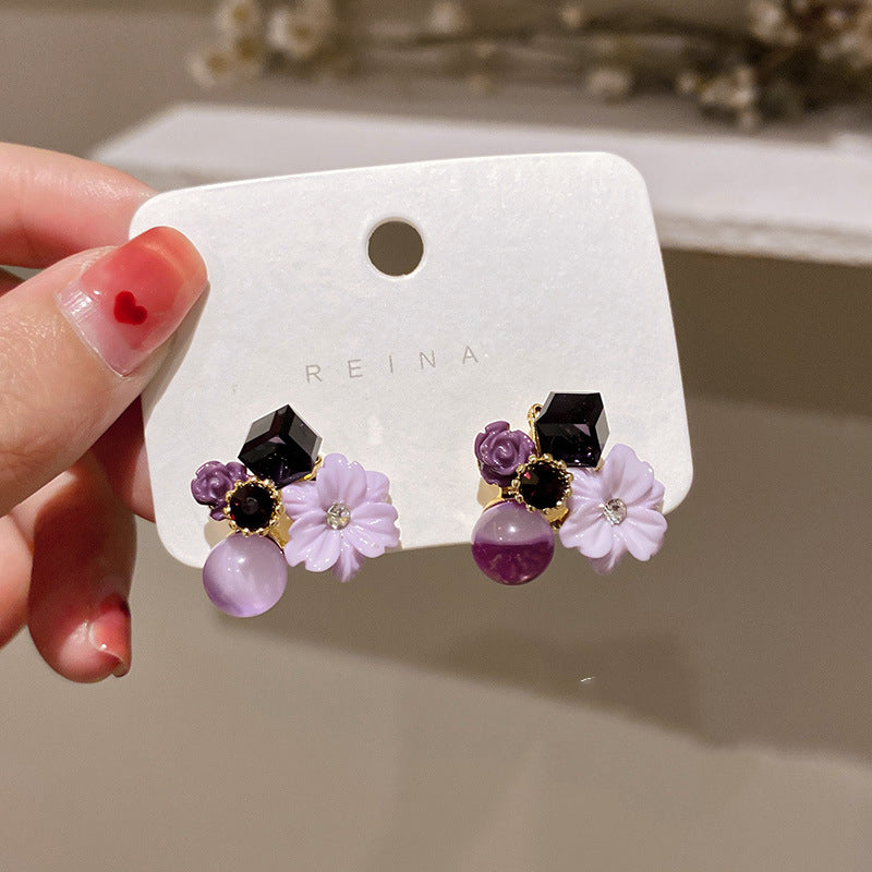 Aretes de flor de cristal ojo de gato diamante estilo coreano "Puerta del Este"