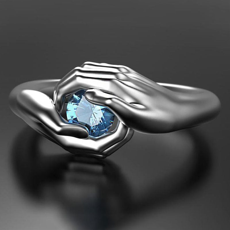 Manos Exquisitas Abrazan Anillo de Zirconia de Cristal Azul Elegante Anillo de Boda de Plata para Mujer Anillo de Compromiso Moda Joyería de Amor Regalo
