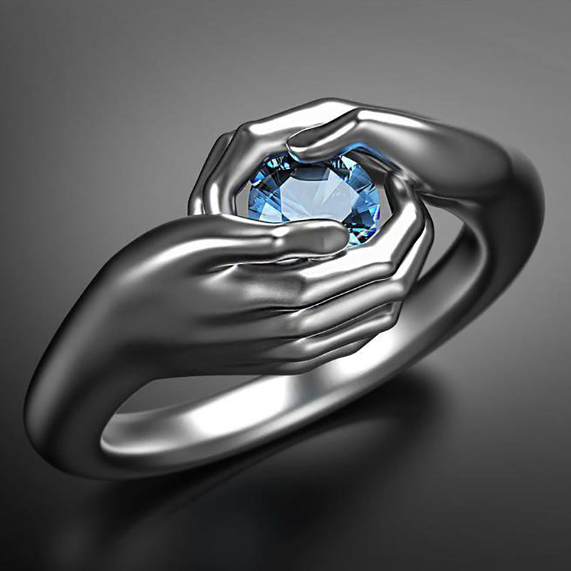 Manos Exquisitas Abrazan Anillo de Zirconia de Cristal Azul Elegante Anillo de Boda de Plata para Mujer Anillo de Compromiso Moda Joyería de Amor Regalo