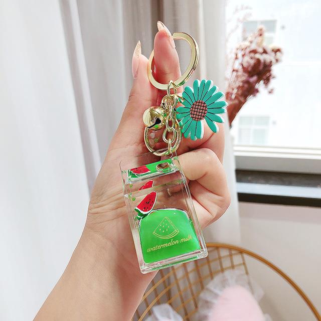 Llavero de coche Botella de jugo de durazno Llavero Joyas de corazón para chica