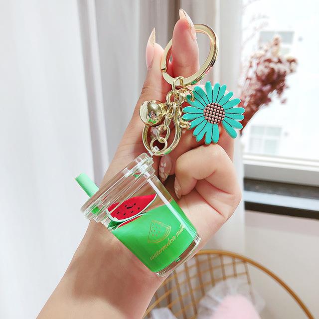 Llavero de coche Botella de jugo de durazno Llavero Joyas de corazón para chica