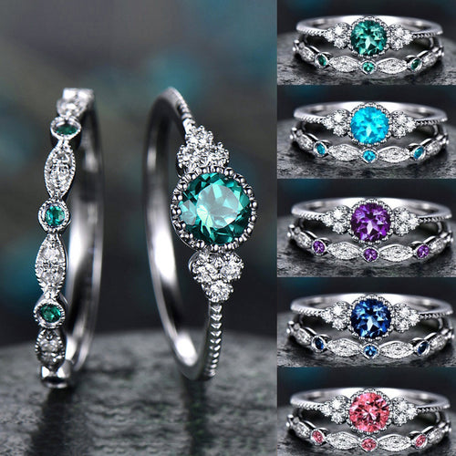 2 anillos de diamantes de colores con pedrería