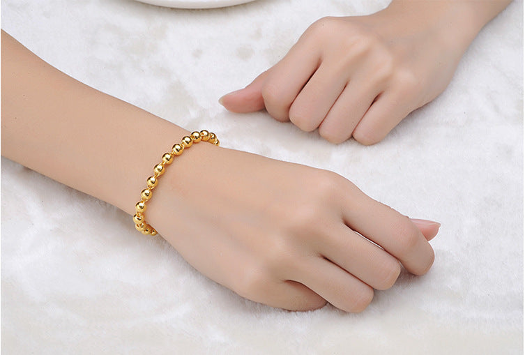 Herren-Armband aus runden Perlen mit 24k Goldimitation