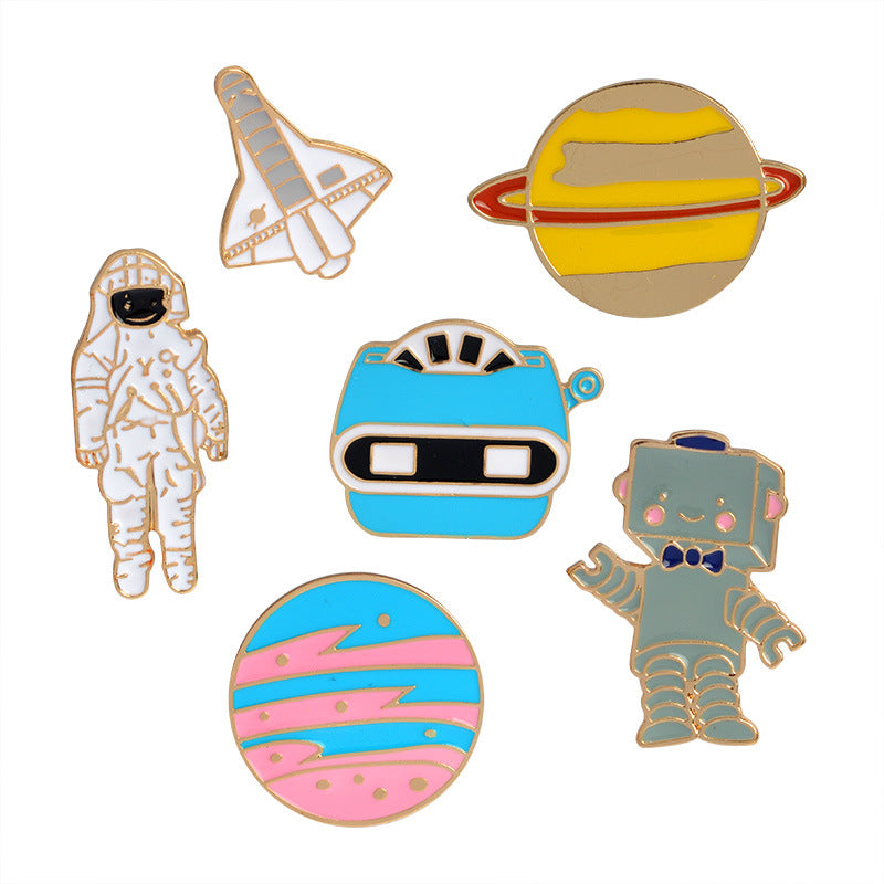 Broche de dibujos animados creativo de avión, astronauta, robot y planeta goteando