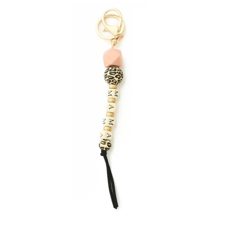 Llavero de cadena de leopardo con colgante de silicona con letras de madera y oblea