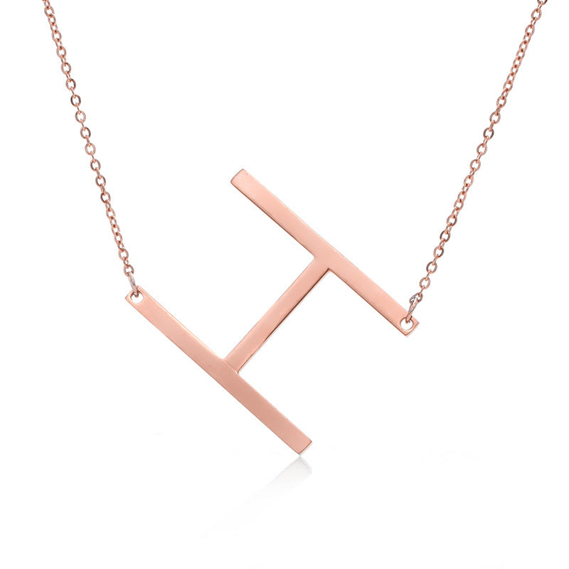 Fabuloso collar con colgante de letra inicial de acero inoxidable chapado en oro rosa
