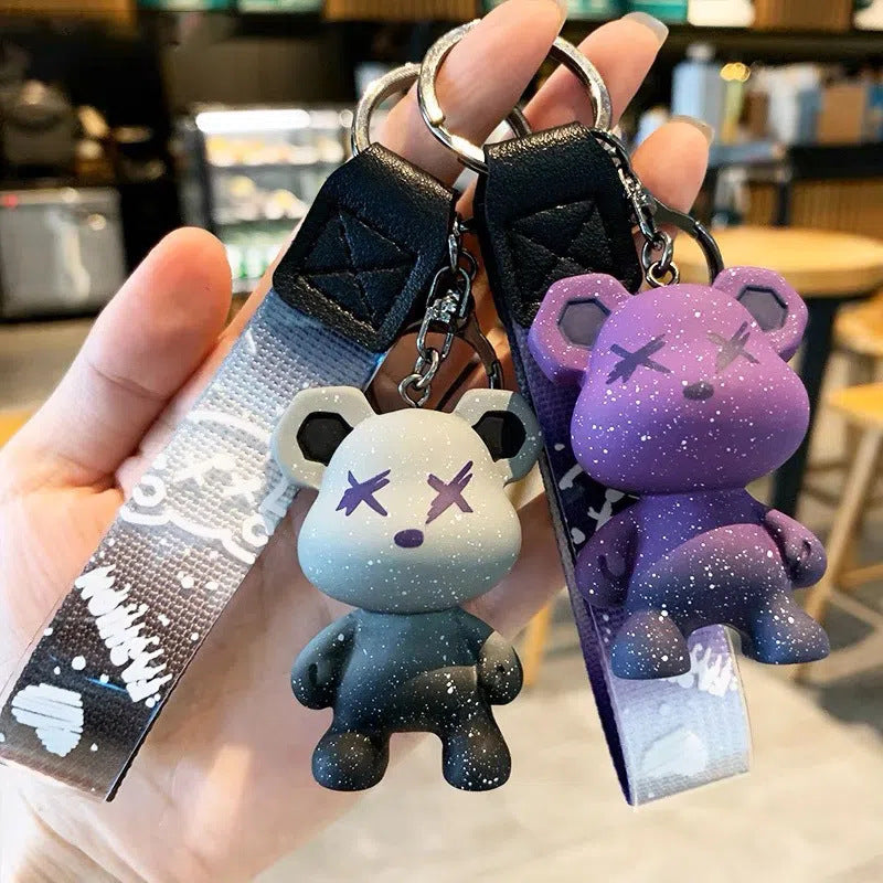 Llavero de gel de sílice con diseño de oso camaleón estrellado de dibujos animados