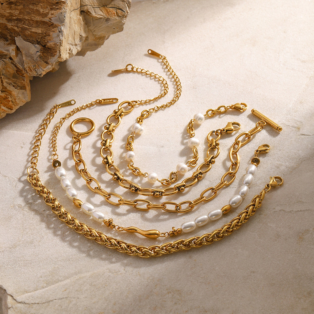 Damen-Armband aus Edelstahl mit Goldperle