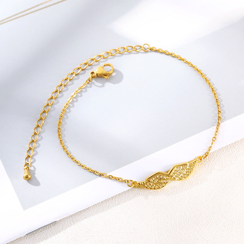 Nueva pulsera con dije de alas de ángel