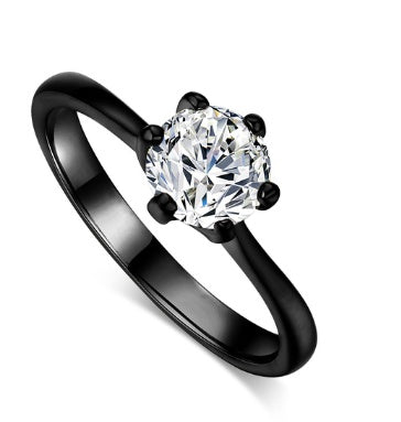 Anillo de oro rosado y circonita