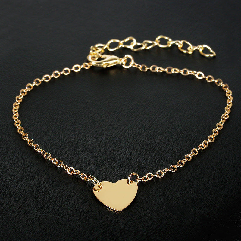 Pulsera tobillera con dije de corazón sencilla