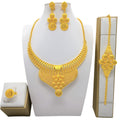 Juego de cuatro piezas de joyería de oro de 24 quilates: collar, pulsera, pendientes y anillo