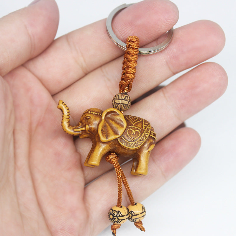 Llavero de elefante estereoscópico con dije de resina