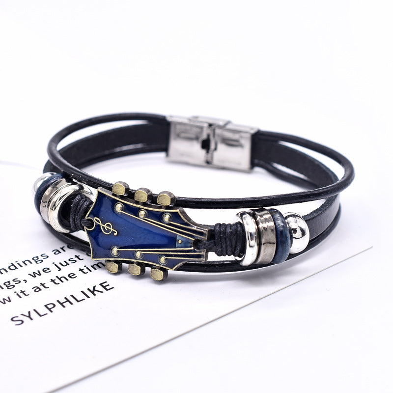 Europäische und amerikanische Zinklegierungs-Musikgitarren-Lederarmband