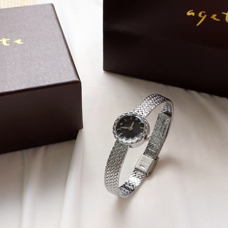 Reloj de mujer pequeño Simple Retro, de interés especial, de lujo ligero, dorado
