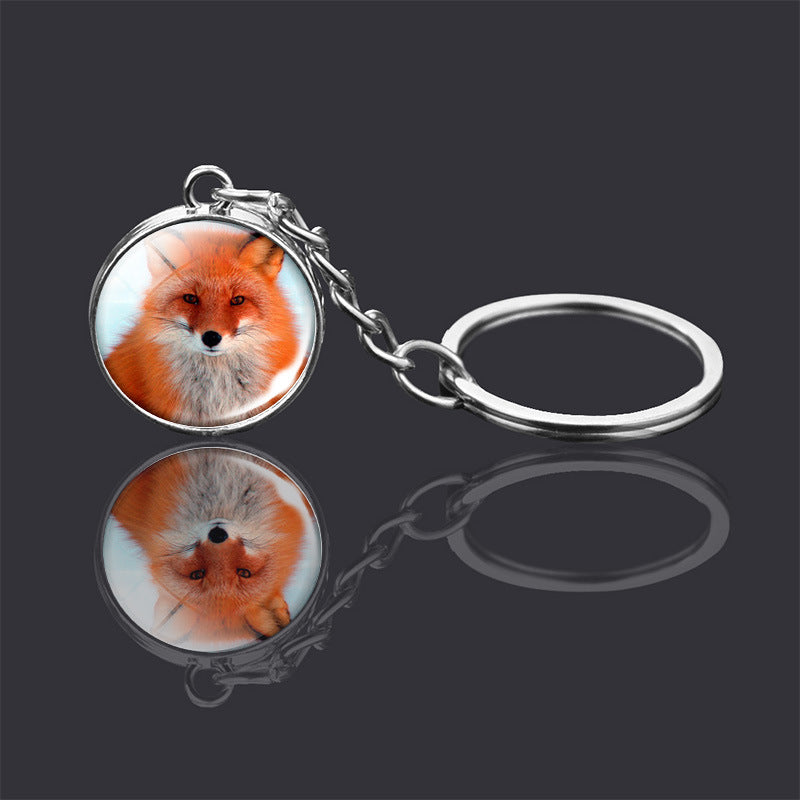 Adorno de llavero de bola de cristal de doble cara con animal