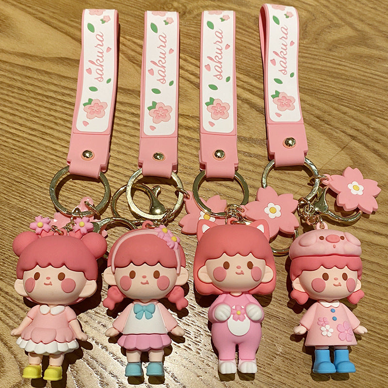 Nuevos Llaveros con Diseño de Muñeca de Niña con Flores de Cerezo
