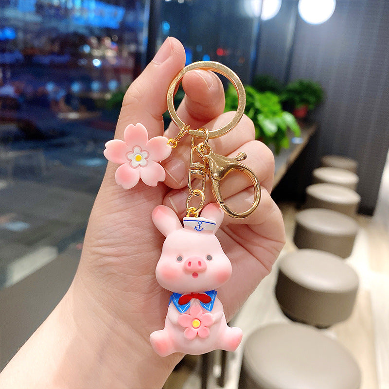 Llavero creativo con personalidad de cerdito de flor de cerezo