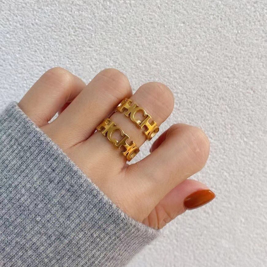 Anillo de acero inoxidable calado con letras para hombre y mujer, joyería de alta calidad