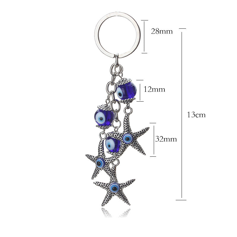 Llavero de estrella de mar, pavo, ojo azul