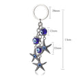 Llavero de estrella de mar, pavo, ojo azul