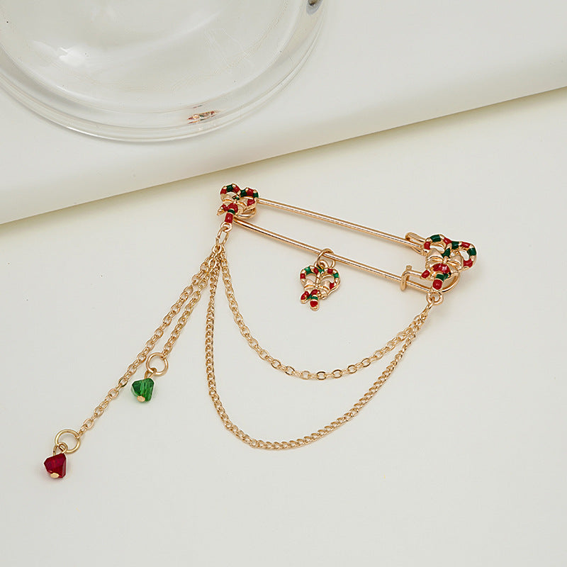 Broche de moda con cadena y cascabel