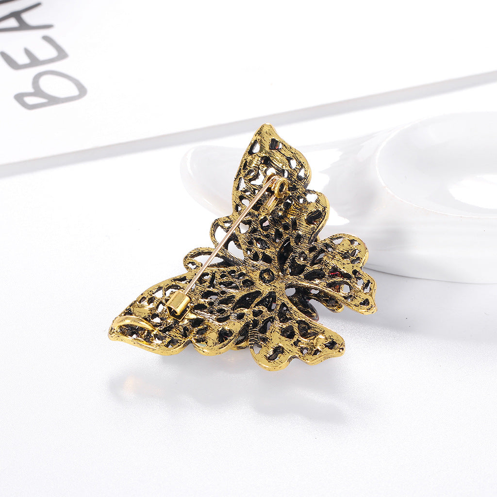 Broche de mariposa de moda con diamantes de imitación de colores