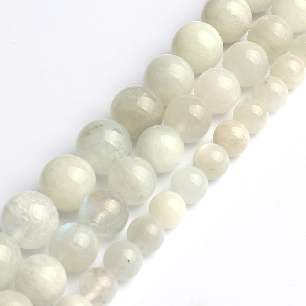 Accesorios de joyería de cuentas de piedra lunar azul blanca
