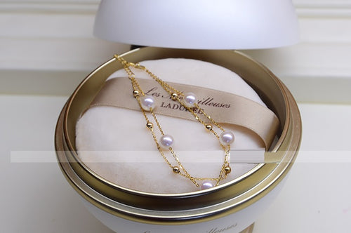 Armband aus 18k Gold mit Salzwasserperle, verstellbar, doppelreihig