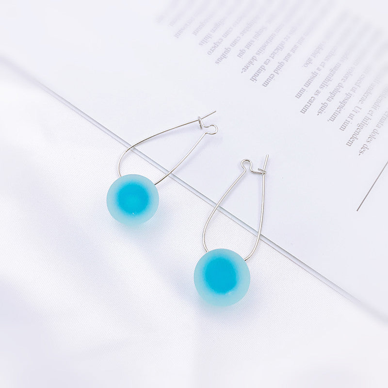 Koreanische Bogenquasten-Ohrringe asymmetrische Perlenblumen-Ohrringe