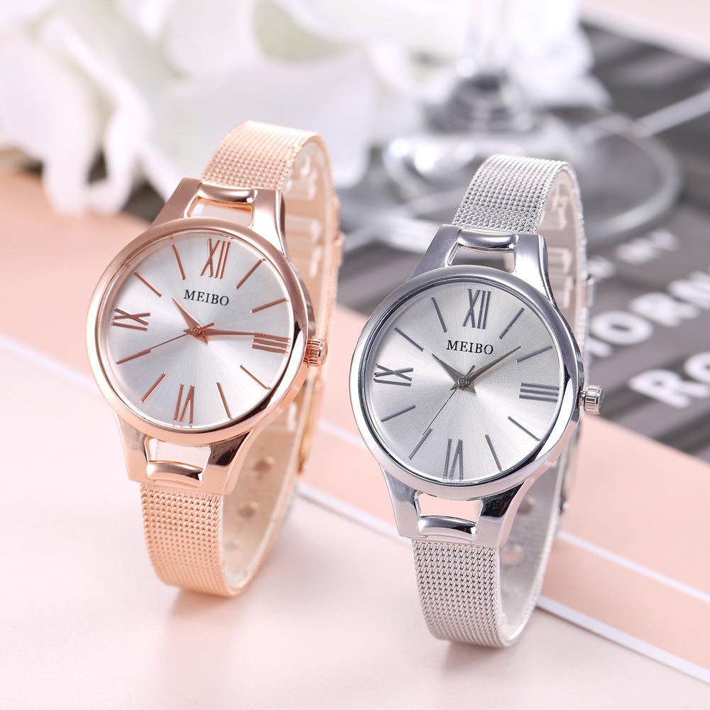 Reloj de malla de acero inoxidable en oro rosa con esfera redonda, hebilla de pasador y cristal, modelo Harmony Sale, para mujer
