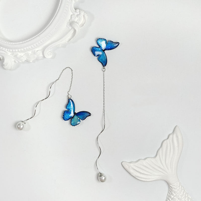 Pendientes largos de plata de ley S925 con perlas y mariposas azules