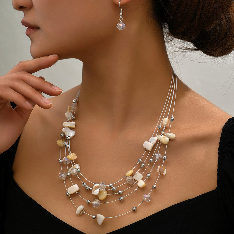 Conjunto de pendientes y collar bohemio de varias capas con conchas y cristales