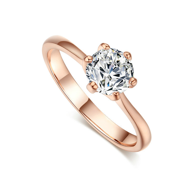 Anillo de oro rosado y circonita