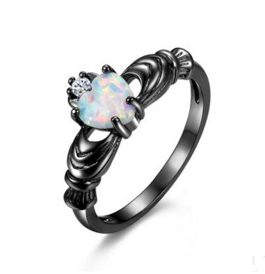 Herz-Opal-Kronen-Pistolen-Schwarzring