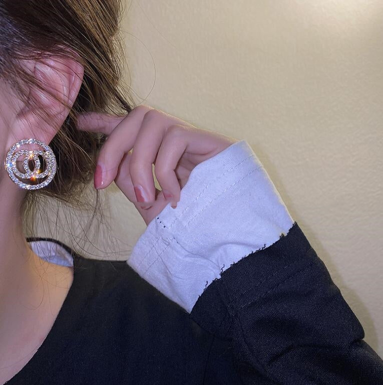 Aretes redondos de diamante completo