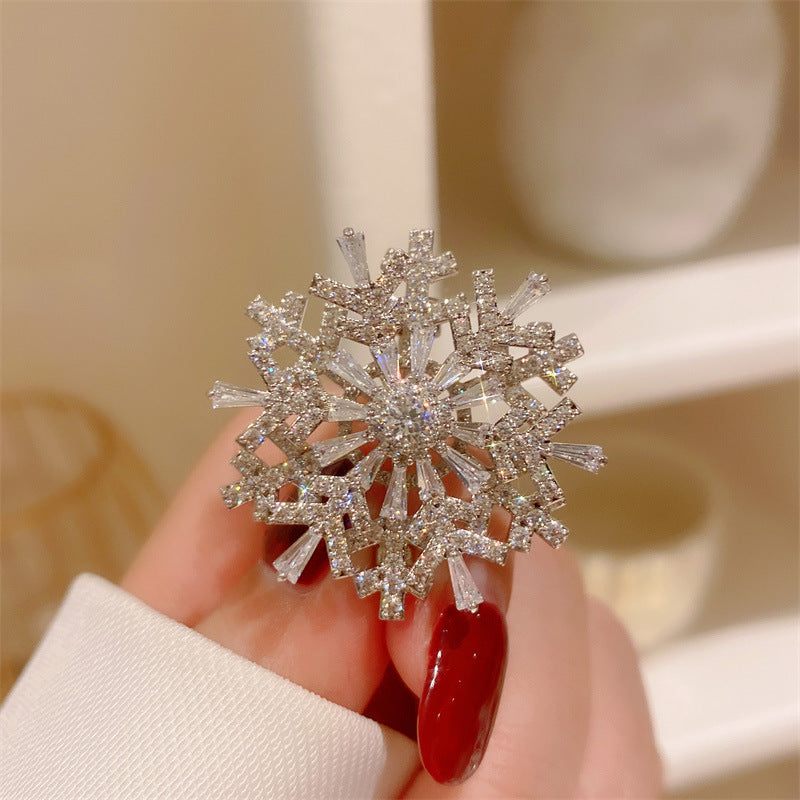 Broche giratorio de circonitas de copo de nieve estéreo Advanced Sense