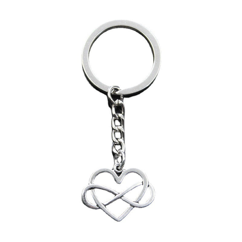 Llavero con forma de corazón ahuecado en forma de ocho para hombre y mujer